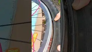 Every Cyclist Should Know This Trick! How to Easily Put on a Bicycle Tire #shorts #bike #tips