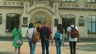 students walk through the foyer of a modern university | Free Stock Footage - No Copyright
