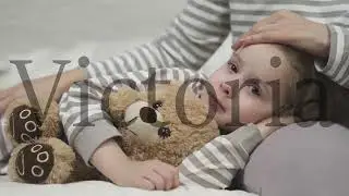 little child daughter lies her mother lap hugging teddy bear. time sleep kid. mom strokes cares girl