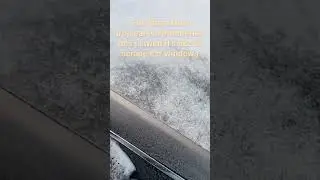 Scraping a car’s windows after a blizzard