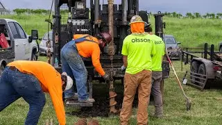 Geotechnical drillers pull a 70-foot column of soil