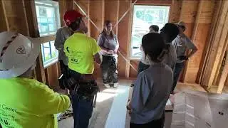 September 11 Day of Service volunteers help rebuild a home destroyed by Hurricane Ida