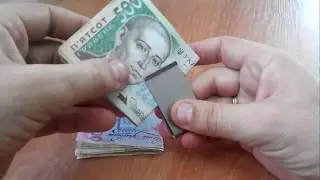 Зажим для денег двусторонний.