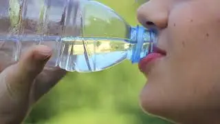 No Copyright Drinking Water from Plastic Bottle | Parched Stock Footage Video | Royalty Free