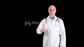 Male doctor in medical gown with phonendoscope showing thumbs up on black background. Medical worker