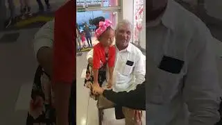 Man in wheelchair falls while playing with child in Higuey, Dominican Republic
