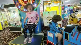 Thomas the tank engine kiddie ride and smiley face clock kiddie ride
