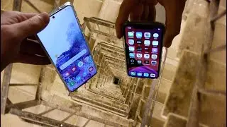 Dropping Samsung Galaxy S20 vs iPhone 11 Pro Down Spiral Staircase - 200 Feet - Will It Survive?