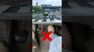 How do you stop quickly while driving a manual car? 