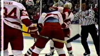 Mike Peluso fights Rick Zombo with Bob Probert third man in, Sep 19, 1990