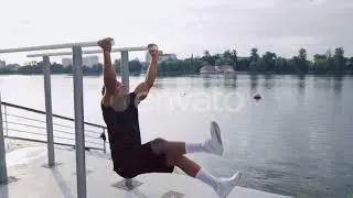 Muscular Man Doing Abdominal Exercises Near the Lake | Stock Footage - Envato elements