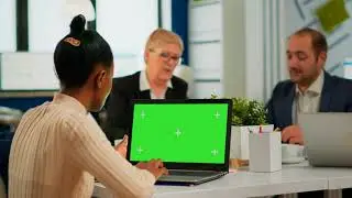 Woman sitting at conference Green screen