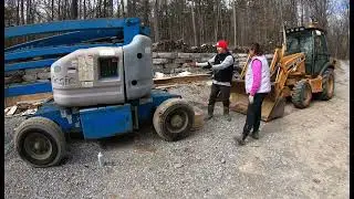 Larry's New Tires!  Swapping out tires on our Genie Lift.