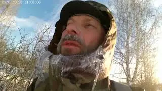Bicicle sporting ride in Russian winter to the tipical natural drinking water column.