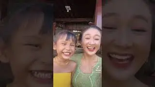 Balinese Mother Asks for Money