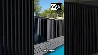 Металевий паркан графітового кольору