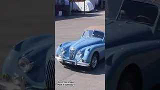 Classic convertable Jaguar on the road. Video production services by fvs.lv 