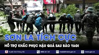 Lực lượng vũ trang tỉnh Sơn La giúp đỡ nhân dân khắc phục hậu quả, tìm kiếm người mất tích. - VNews