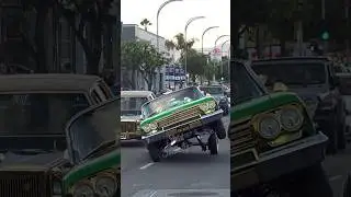 62 Chevy Impala Lowrider cruising 3 wheel motion!