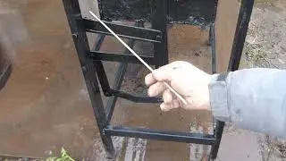 Мангал с механизмом подъема жаровни.