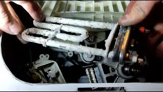 Diagnostics and replacement of the heating element of a Samsung washing machine.