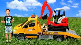 Bruder JCB excavator is broken. Tow truck brought a new crawler excavator