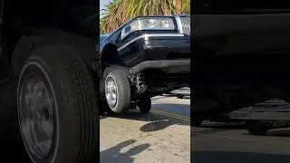 Lincoln Town Car LOWRIDER HOPPING into the air! 