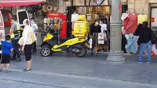 How does an ambulance enter a narrow alley and what happens during rush hour? Ambulances in Israel