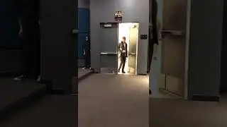 Professor is dressed in a costume and waits to scare students coming to class!