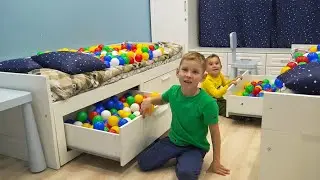 Colored Balls Everywhere Lev and Gleb play withMom