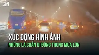 Xúc động hình ảnh những lá chắn di động trong mưa lớn | VTV24