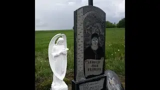 Памятник с Ангелом и Иконой Николая Чудотворца.