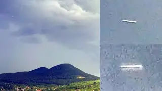 Fast Moving Cylindrical Shaped UFO Captured By Drone Over Csobánka, Hungary