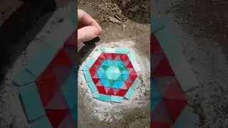 I repaired a hole in the sidewalk with mosaic tiles.