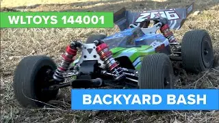 Bashing the WLTOYS 144001 until the wheels fall off... well, one wheel.