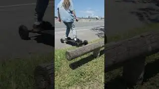 Offroad electric skateboard riding over a big 