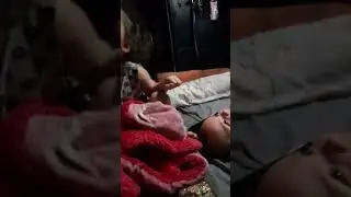Selene playing with her brother Enoch