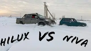 Toyota Hilux против НИВЫ по глубокому снегу!
