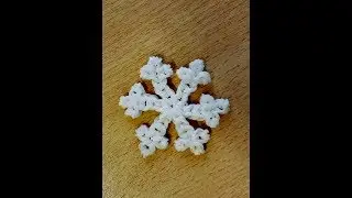Снежинка из резинок на рогатке