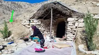 Zari's effort to smooth the side wall of the house to make a nomadic bath
