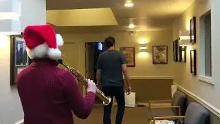 Saxophonist Follows Scott Carty Around The Studio