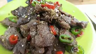 Жаренная говядина с кумином (孜然牛肉)