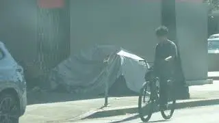 Homeless Tents Camp Back Sunset Sound Hollywood Los Angeles California USA Summer August 16, 2024