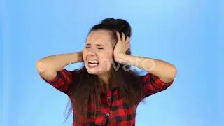 Young Female Is Closing Her Ears and Shouting | Stock Footage - Envato elements