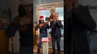 Here is Andy and Laura sharing their holiday spirit by performing 