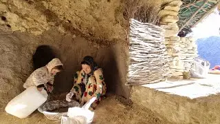 Bringing plaster and strengthening the cave cavity with plastering by Zari, a nomadic woman