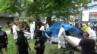Tensions flare as Toronto homeless camp cleared
