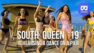 VR180 3D. Girls from a beauty contest South Queen rehearsing a bikini dance on a pier