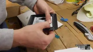 Guide for installing 3M carbon fiber DI-NOC on a lightswitch plate from CarbonFiberFilm.com