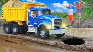 Bruder Dump Truck Mack stuck on a bridge - Children fixed the bridge